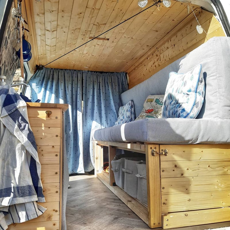 bed and bench design in a ford transit connect camper