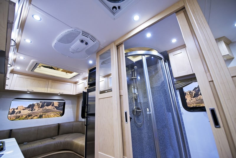 travel trailer rv with an onboard shower head upgrade