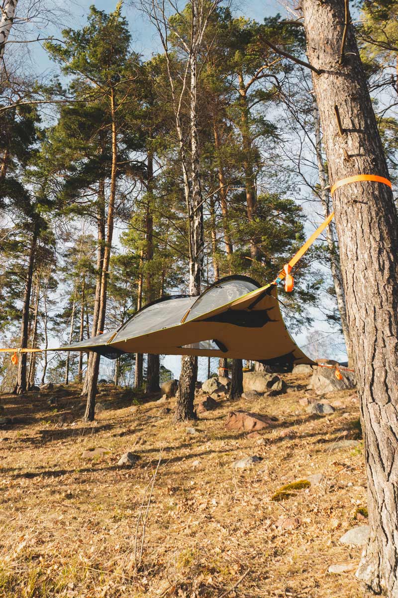 center hatch to climb into a tree tent while camping
