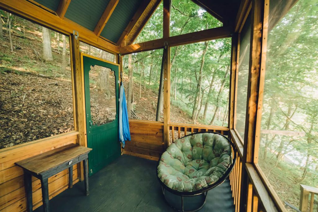 inside of a treehouse cottage cabin in the woods of virginia