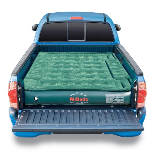 sleeping on a truck bed mattress