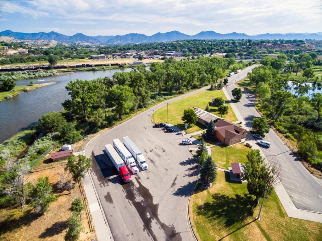 cars and trucks parked overnight at a rest stop in colorado