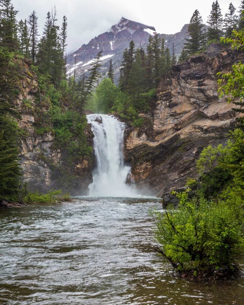 twin falls waterfall in glacier national park montana