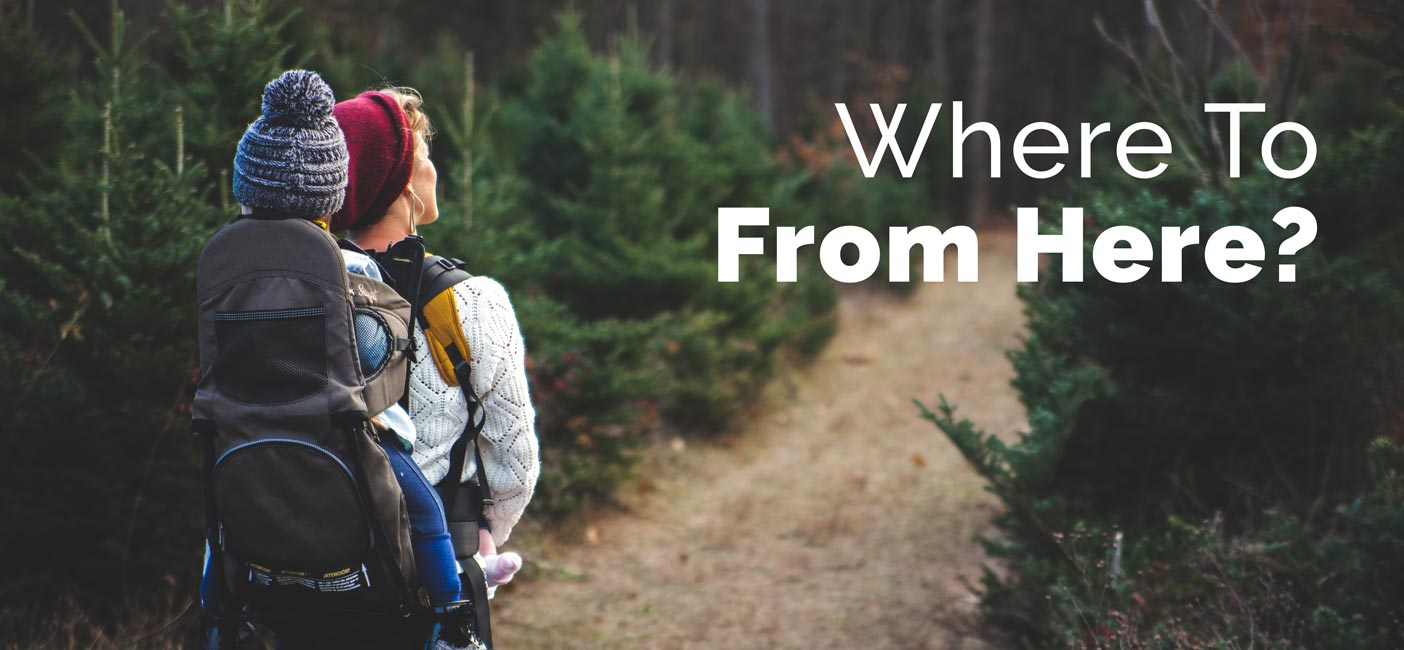 mom and child going on a hike in the woods with plenty of warm gear