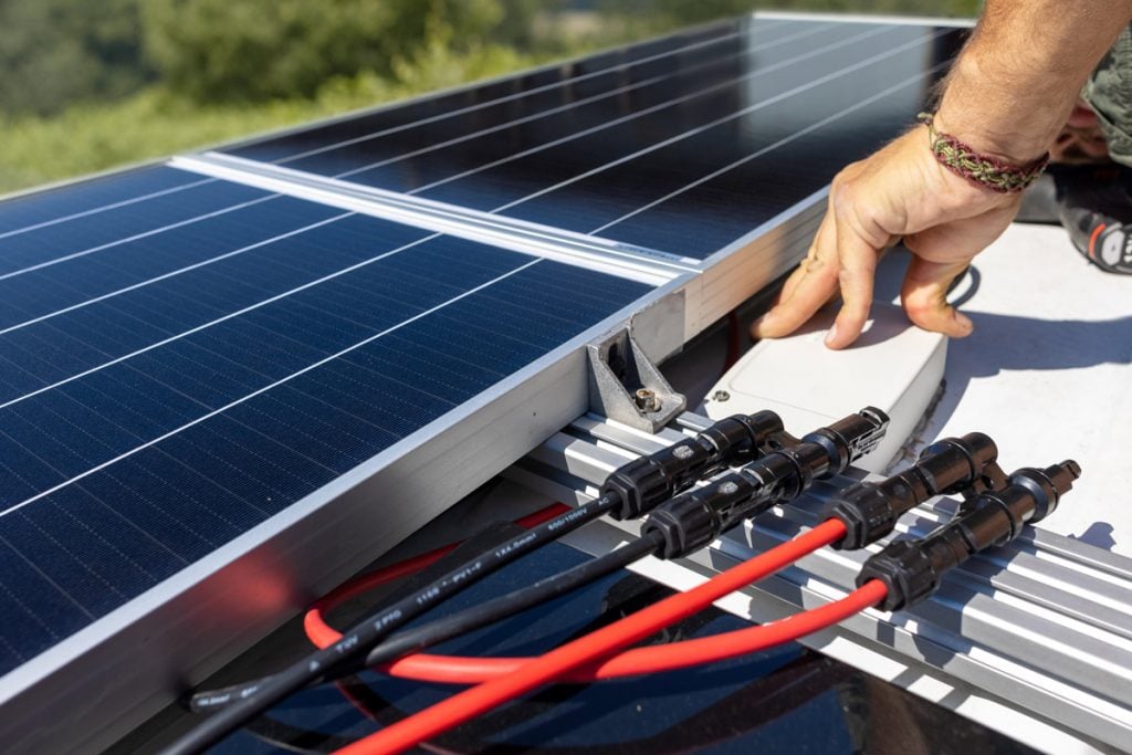 wiring rv solar panels on the roof of a camper